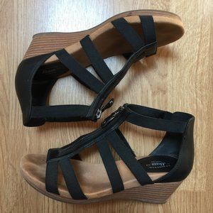 Black closed back strappy sandals with wedge heel